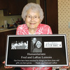LaRue Lemons displays the appreciation plaque.
