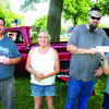 Car show entry winners, left to right, Kris Bronk, Kim Stigall and far right, Giovanni with his dad.