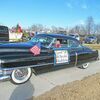 Grand Marshals Clifford and Pat Hodson cruise through the Walnut Grove Christmas Parade, ‘53 Cadillac-style.