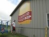 Artist Troy Freeman proofreads his work as he paints new “Certified Angus Beef” signage for the Farm Shop at Gleonda Farms. The new sign is the fourth provided by the American Angus Association to a site in Missouri. (Photos by James McNary)