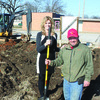 Turning over that first shovel full of dirt are Pamela Allen and Mitchell Boggs.