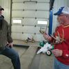 Wayne West, right, discusses proper techniques for the board mounting of deer antlers and skull-cap with Chad Lilienkamp of Lockwood.  West owns and operates both West Automotive (on Main Street in Lockwood), and Wild West Taxidermy. 
(Photo by James McNary)