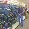 Gordon’s Greenfield Store Manager John Mareth with the recently added line of Century brand tools. (Photo by Gina Langston)