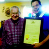 Lawrence Huser, right, receives a 100th Birthday Resolution plaque from State Representative, Mike Kelley. Photo submitted by Lisa Eggerman.